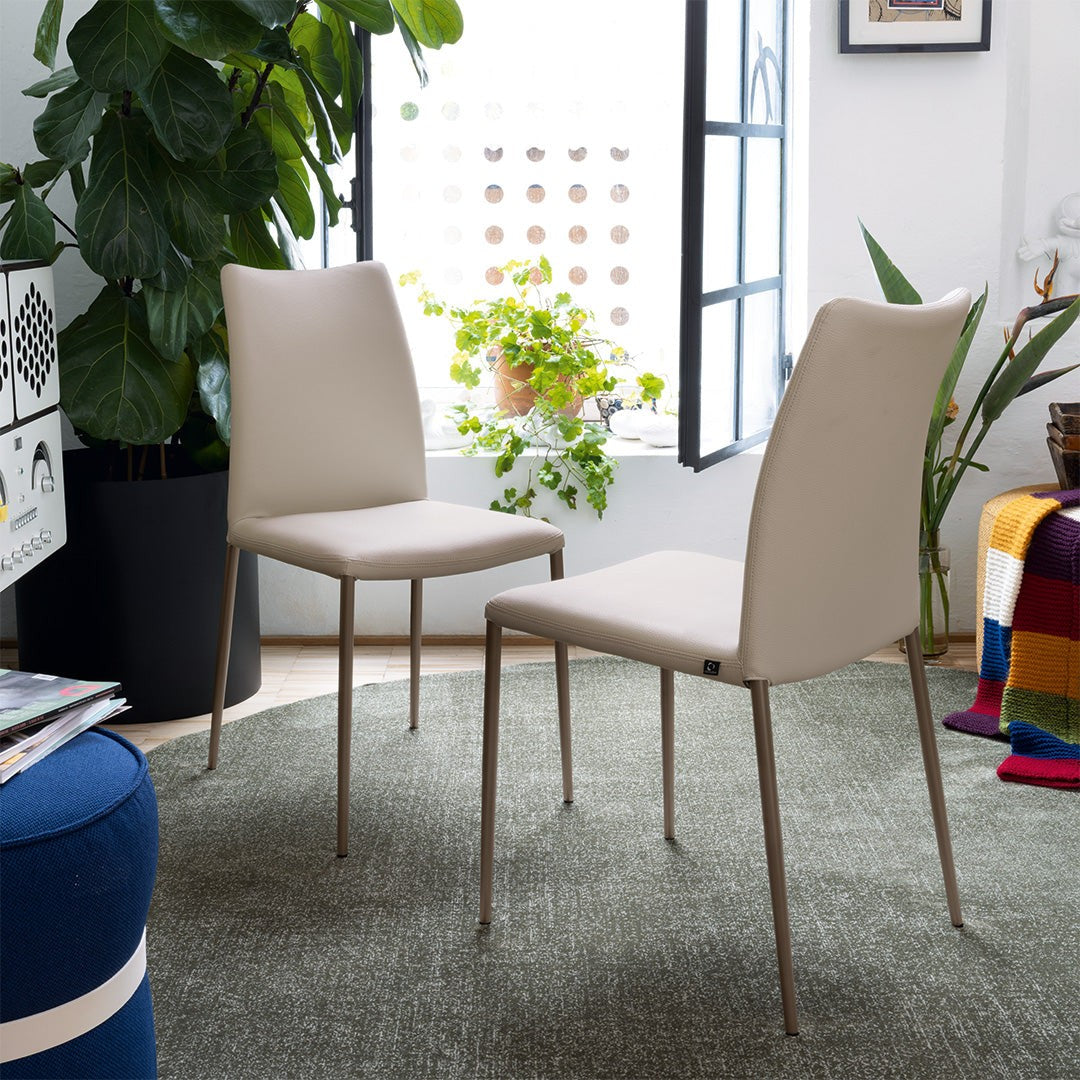 Atlas Metal Faux Leather Dining Chair by Connubia in a styled interior