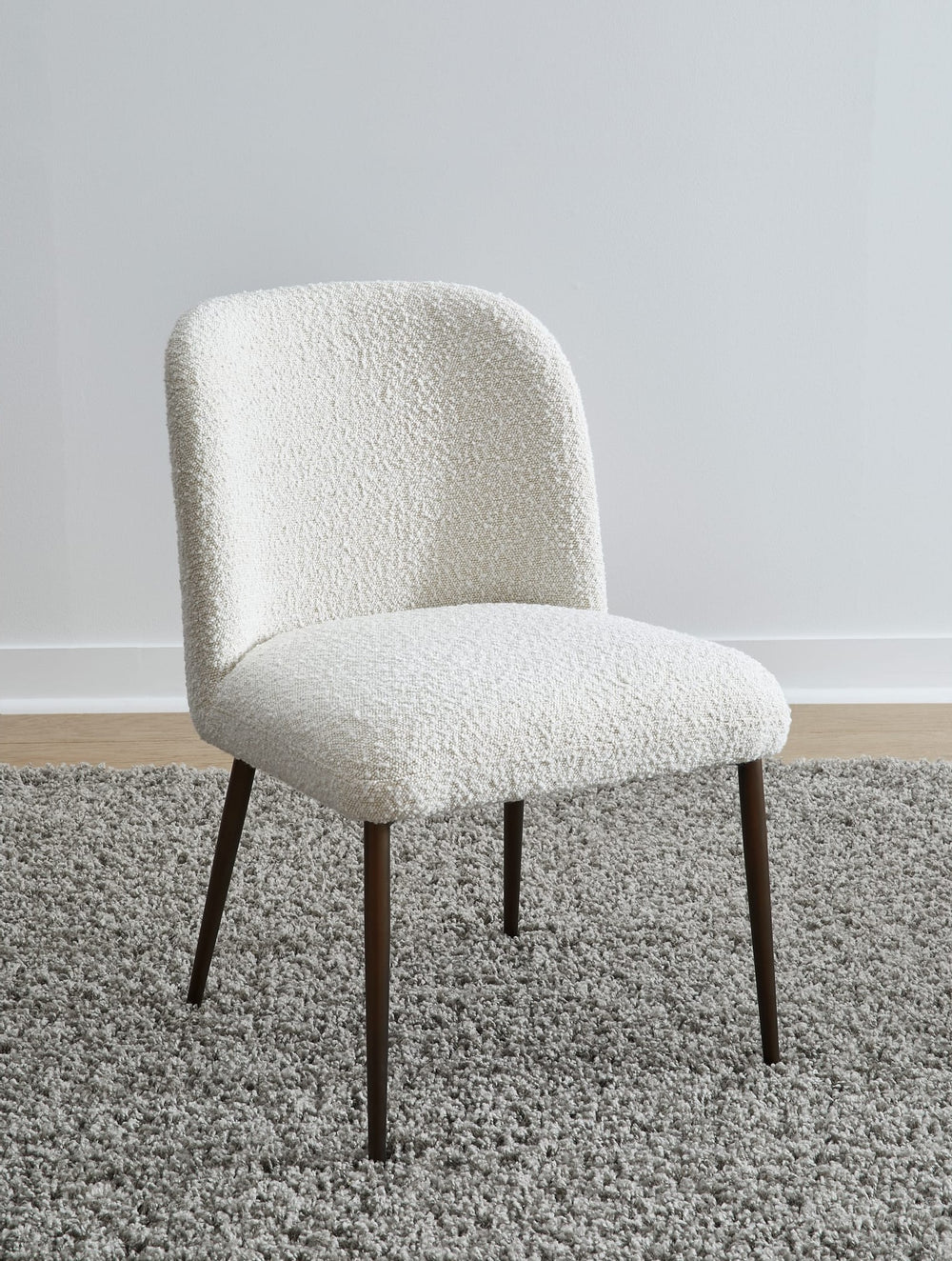 Avery Upholstered Dining Chair in Ricotta Boucle and Bronze Metal — lifestyle photo