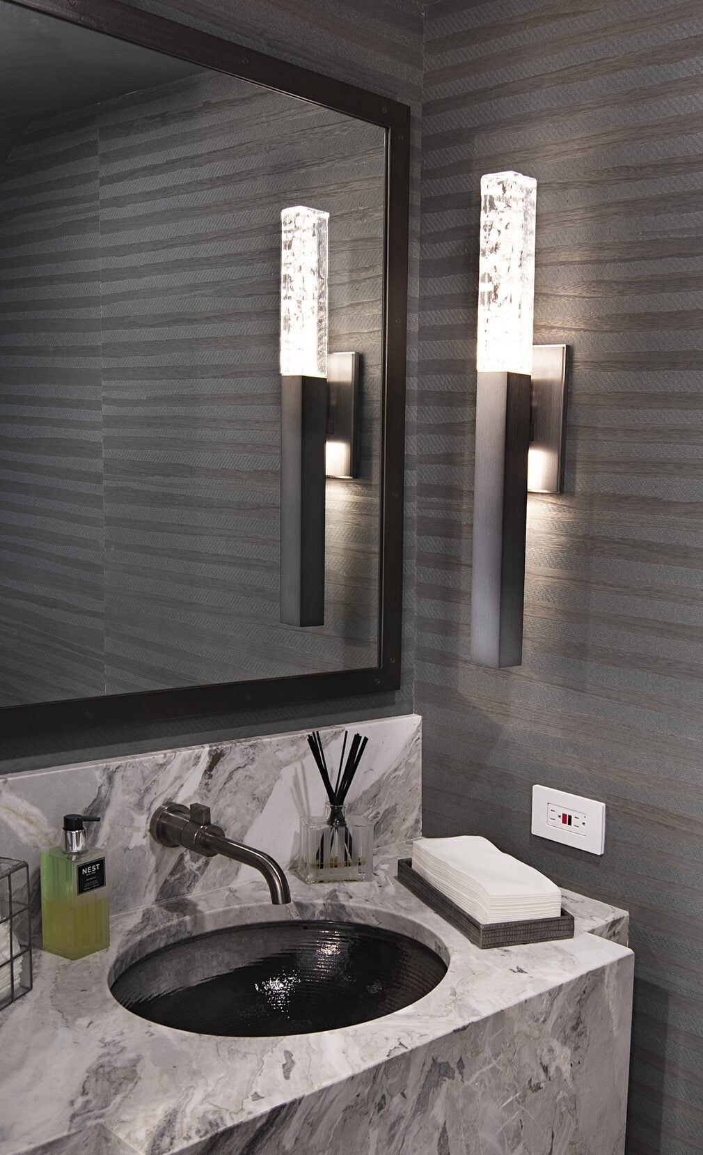 Axis Modern Sconce by Hammerton Studio in a styled interior