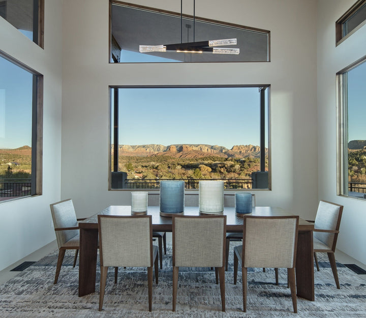 Axis Pivot Linear Chandelier by Hammerton Studio in a styled interior