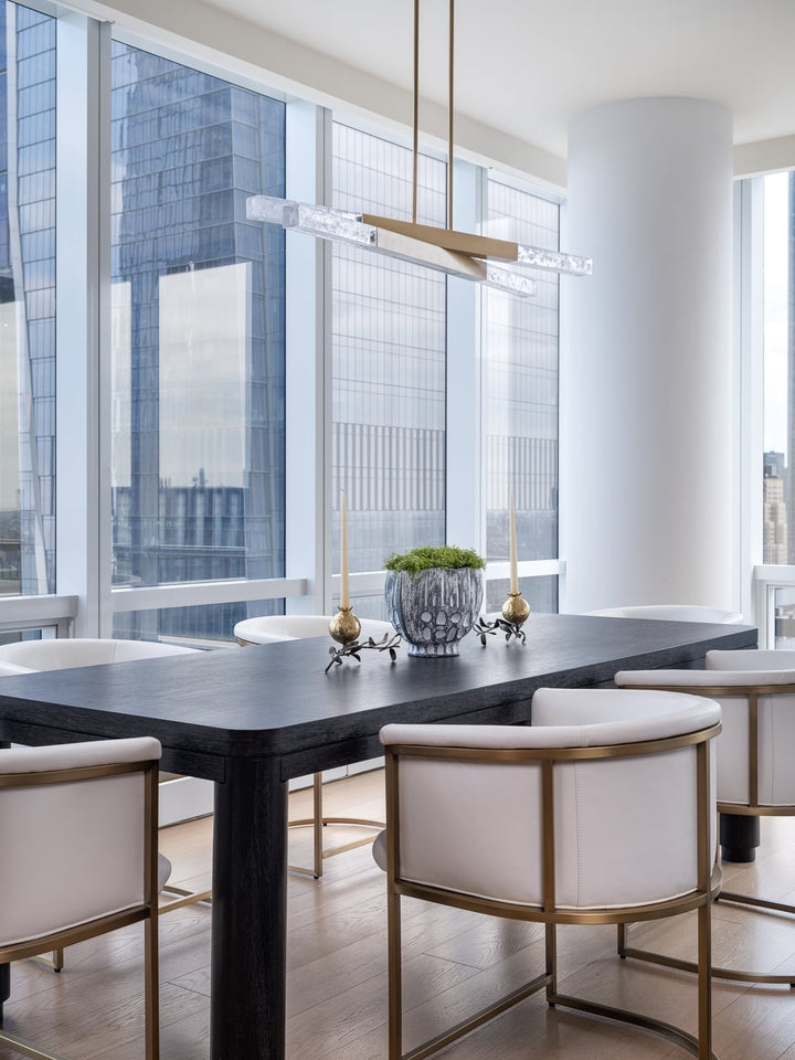 Axis Pivot Linear Chandelier by Hammerton Studio in a styled interior