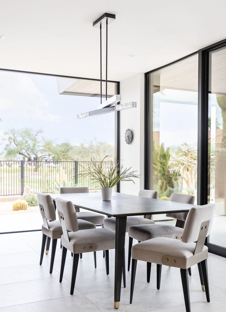 Axis Pivot Linear Chandelier by Hammerton Studio in a styled interior