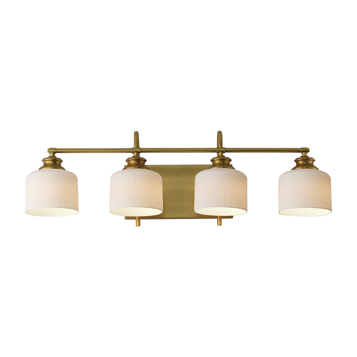 Bisque 4-Light Bath Vanity by Studio M Lighting in Natural Aged Brass