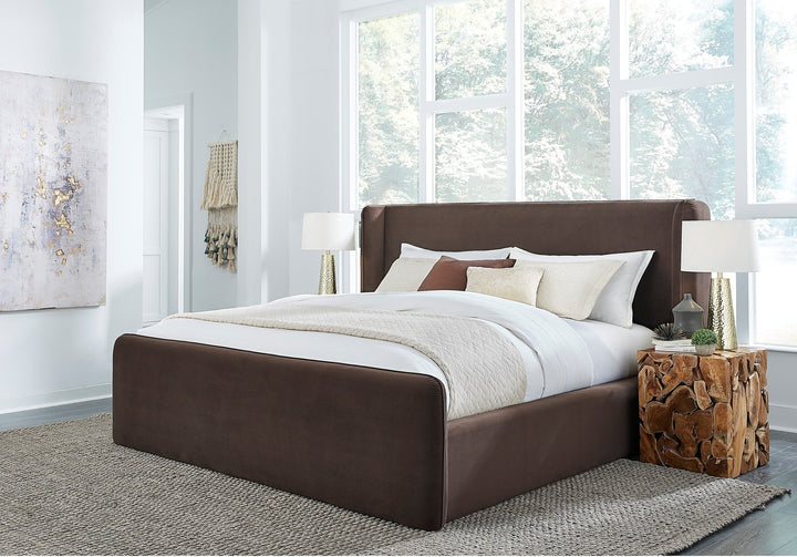 Bacall Velvet Upholstered Wingback Platform Bed in Cola styled in a bedroom