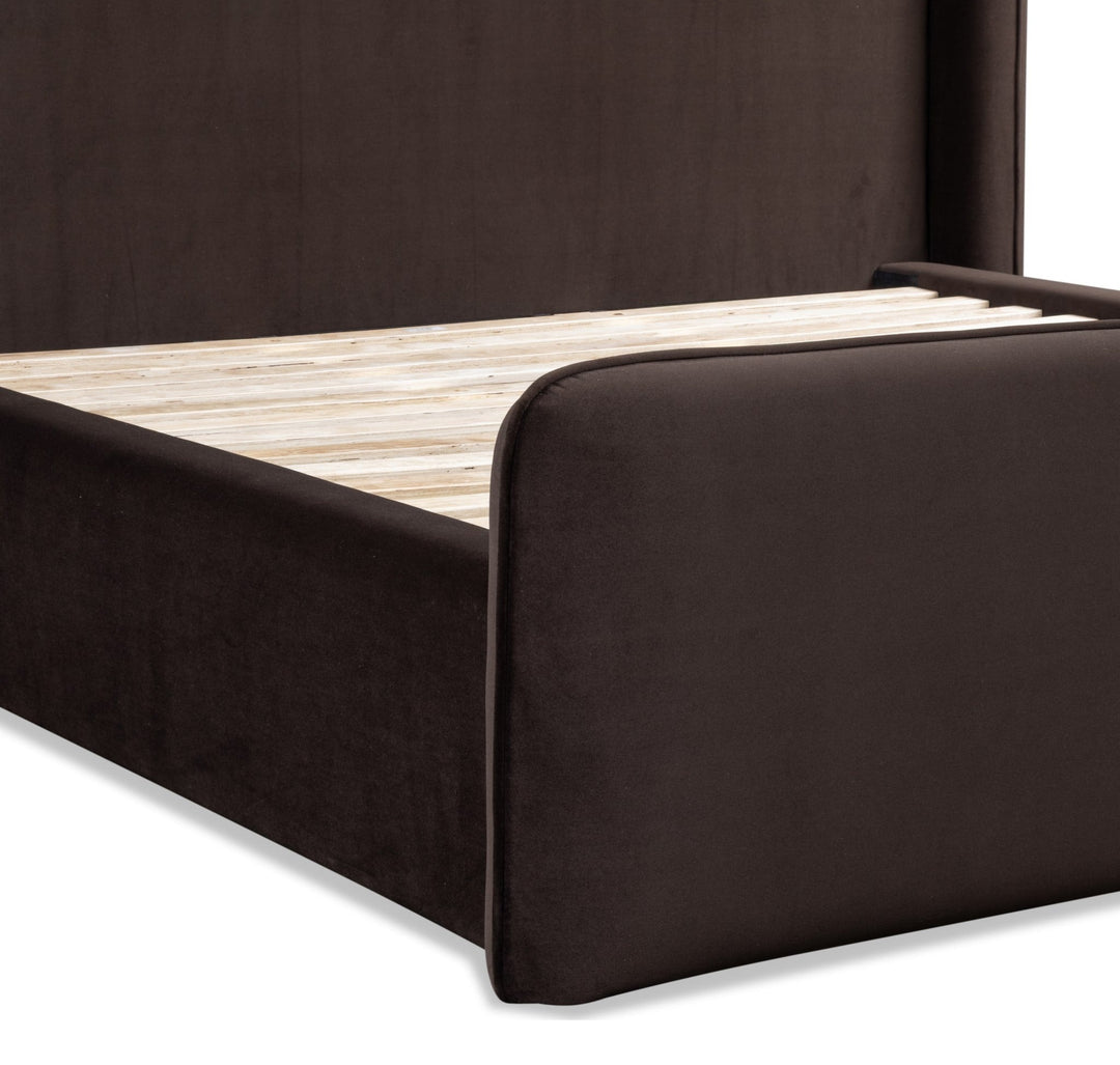 Bacall Velvet Upholstered Wingback Platform Bed in Cola — close-up of the footboard and slats