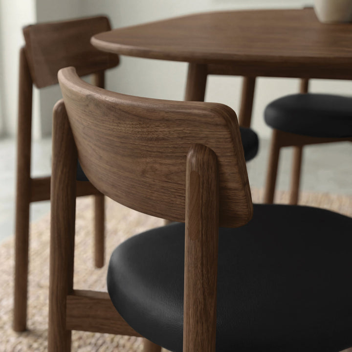 Baton Chairs arranged around a Copeland dining table