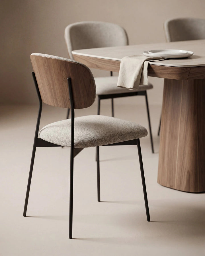 Cove 5020 Dining Side Chair in Walnut / Black / Oatmeal at a dining table