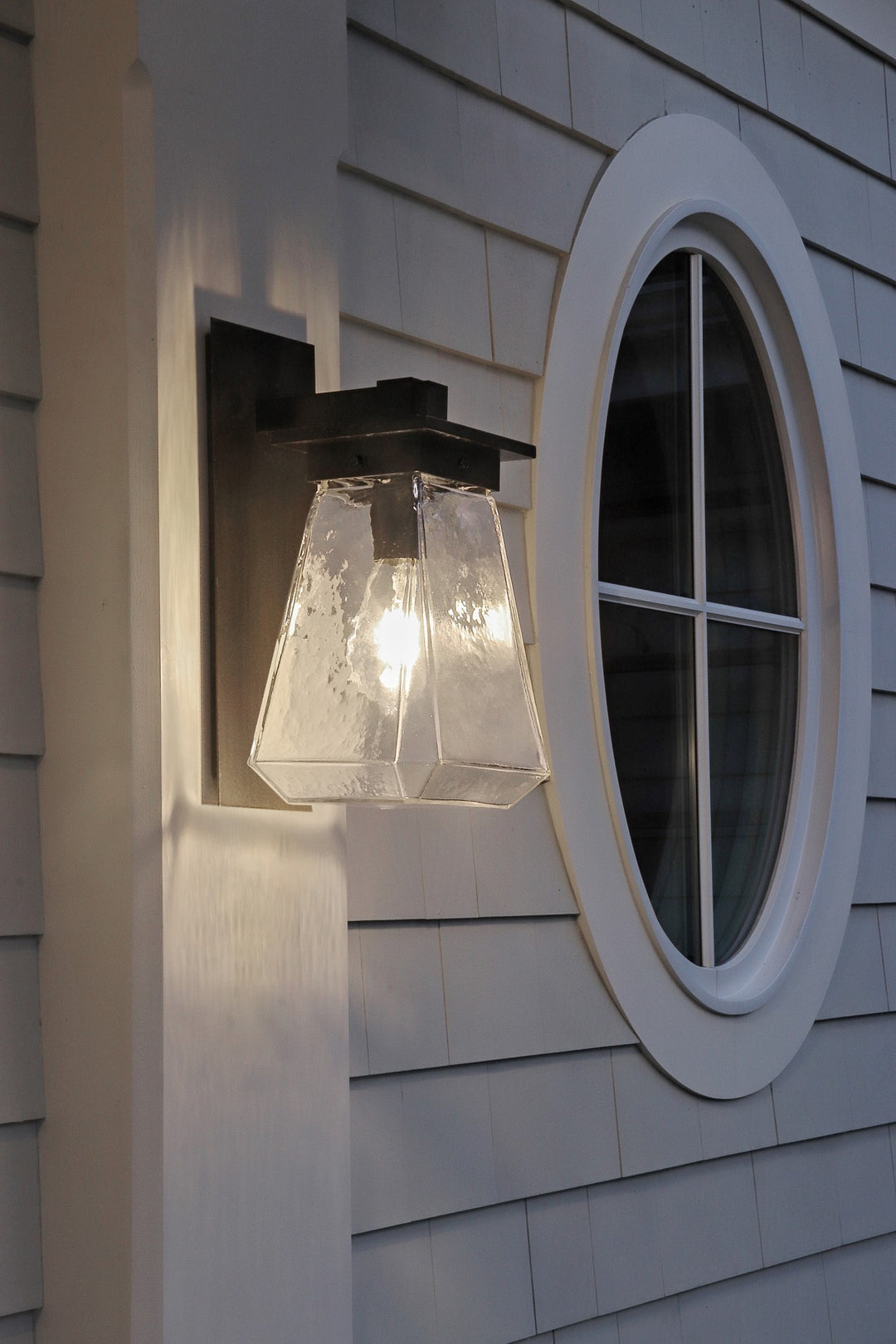 Beacon Outdoor Arm Sconce by Hammerton Studio in a styled interior