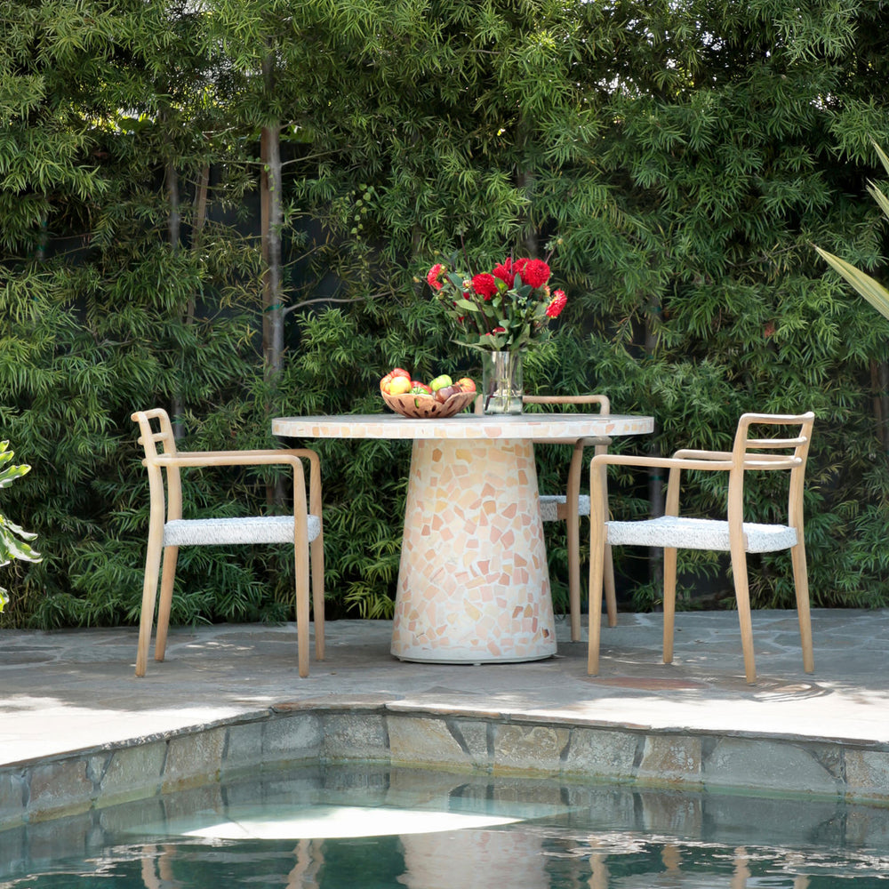 Della White Rope and Teak Outdoor Dining Chair, lifestyle view