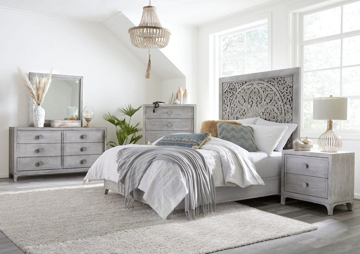 Boho Chic Carved Platform Bed in Washed White styled in a bedroom
