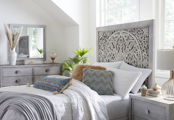 Boho Chic Carved Platform Bed in Washed White styled in a bedroom