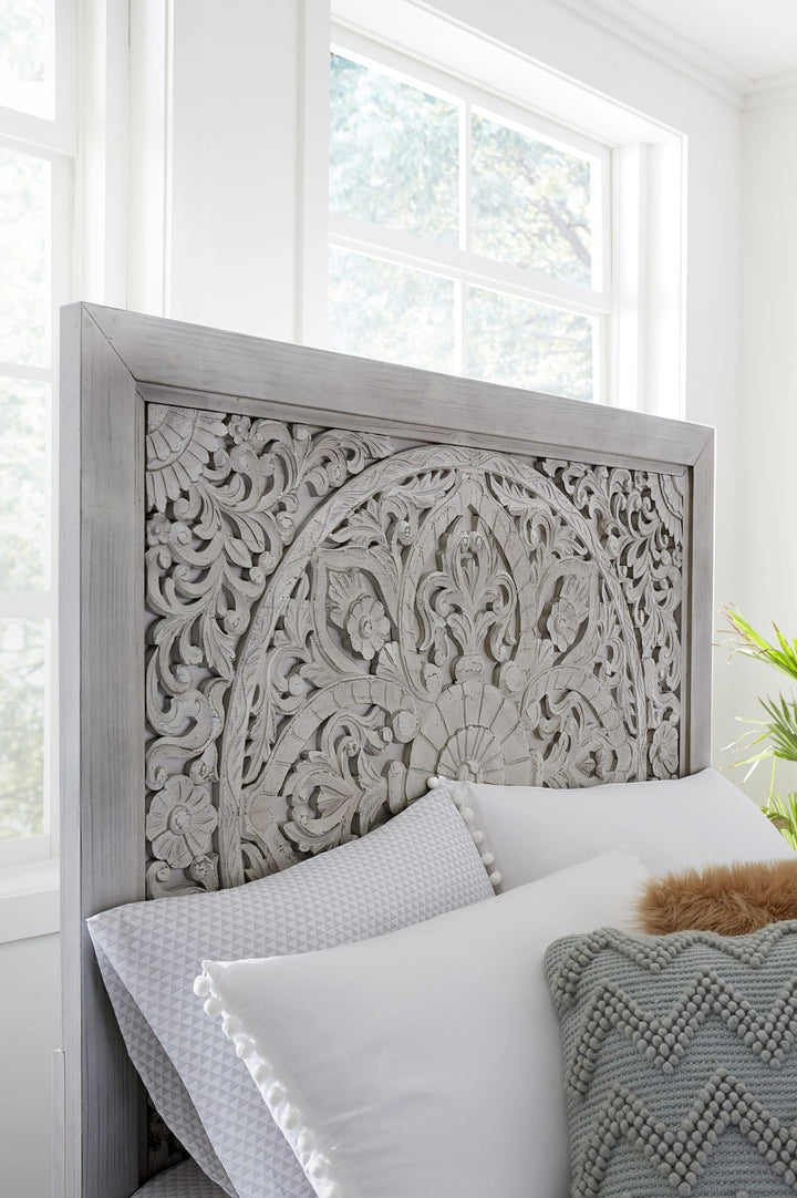 Boho Chic Carved Platform Bed in Washed White styled in a bedroom