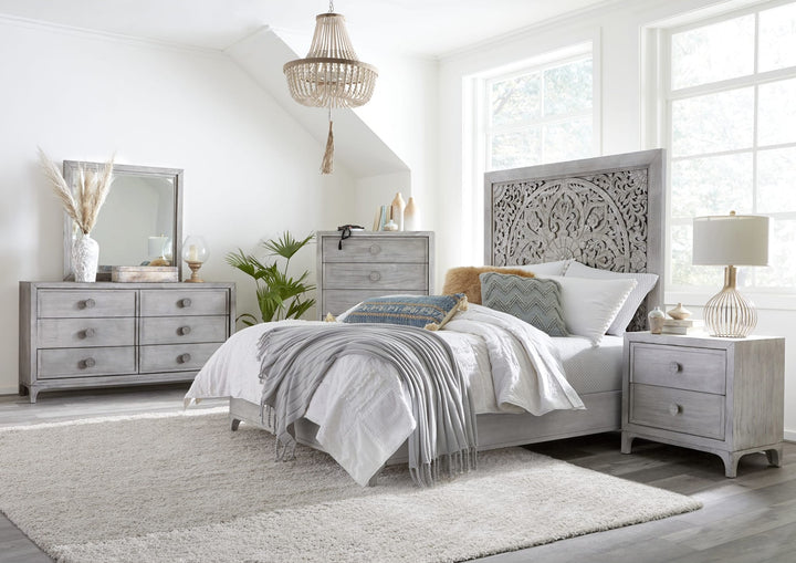 Boho Chic Five Drawer Chest in Washed White — in a bedroom setting