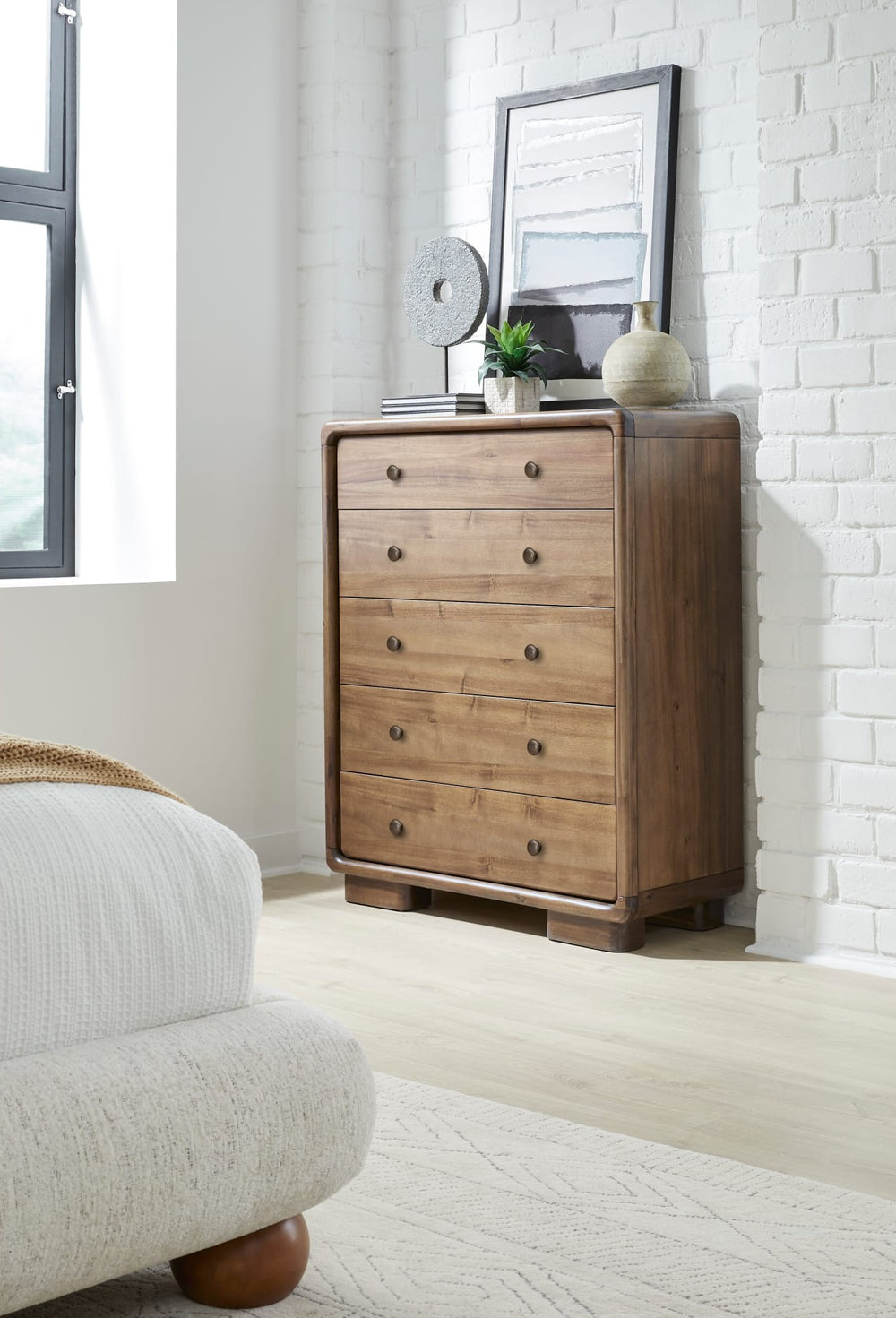 Boka Five Drawer Chest in Impala — styled in a room