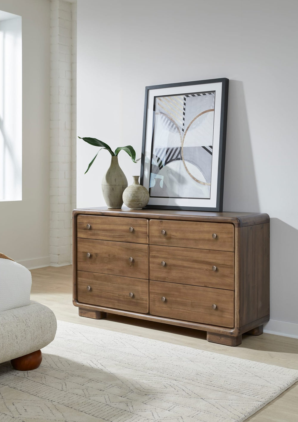 Boka Six Drawer Dresser in Impala — styled with the matching mirror (sold separately)