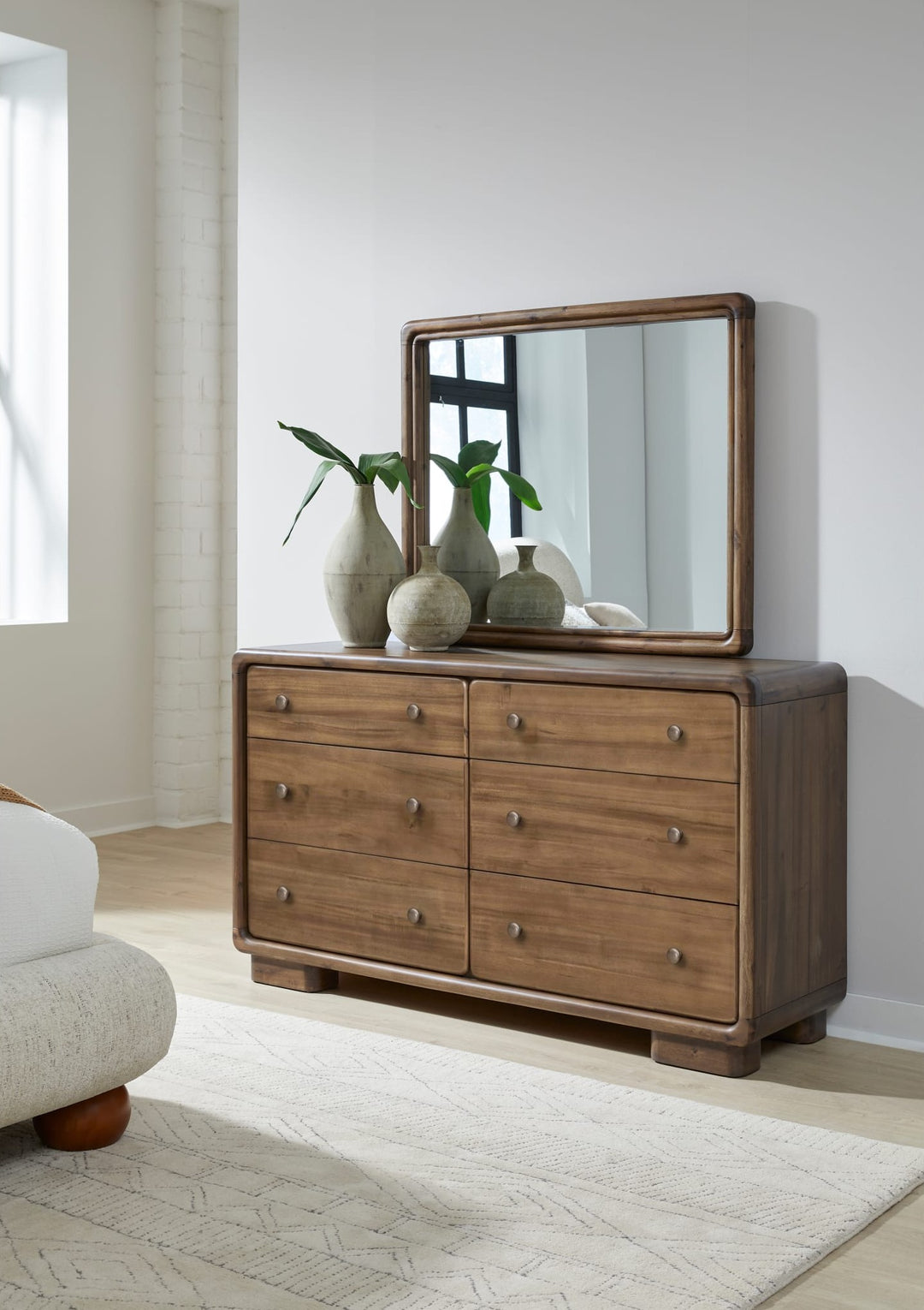 Boka Six Drawer Dresser in Impala — styled with the matching mirror (sold separately)