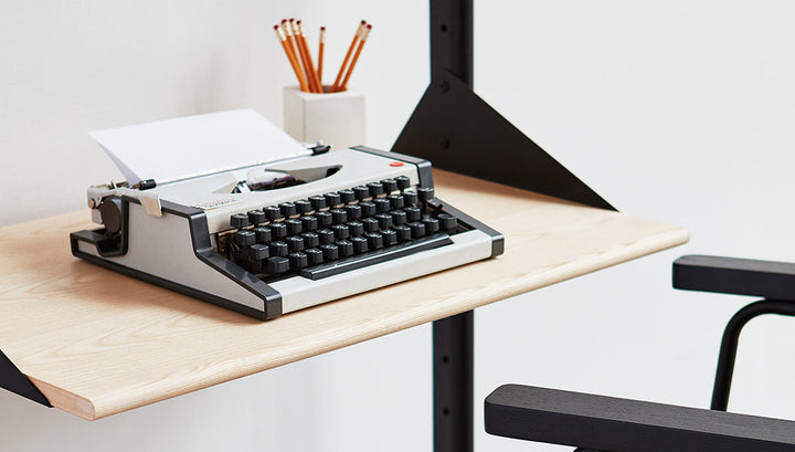 Branch-2 Shelving Unit with Desk by Gus Modern in a styled workspace