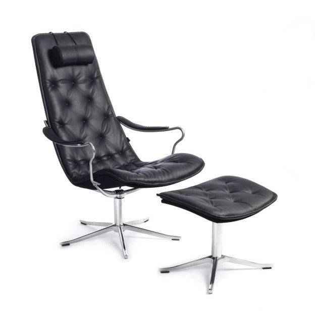 Conform Bravo high-back swivel chair and matching footstool in black tufted leather with polished metal bases