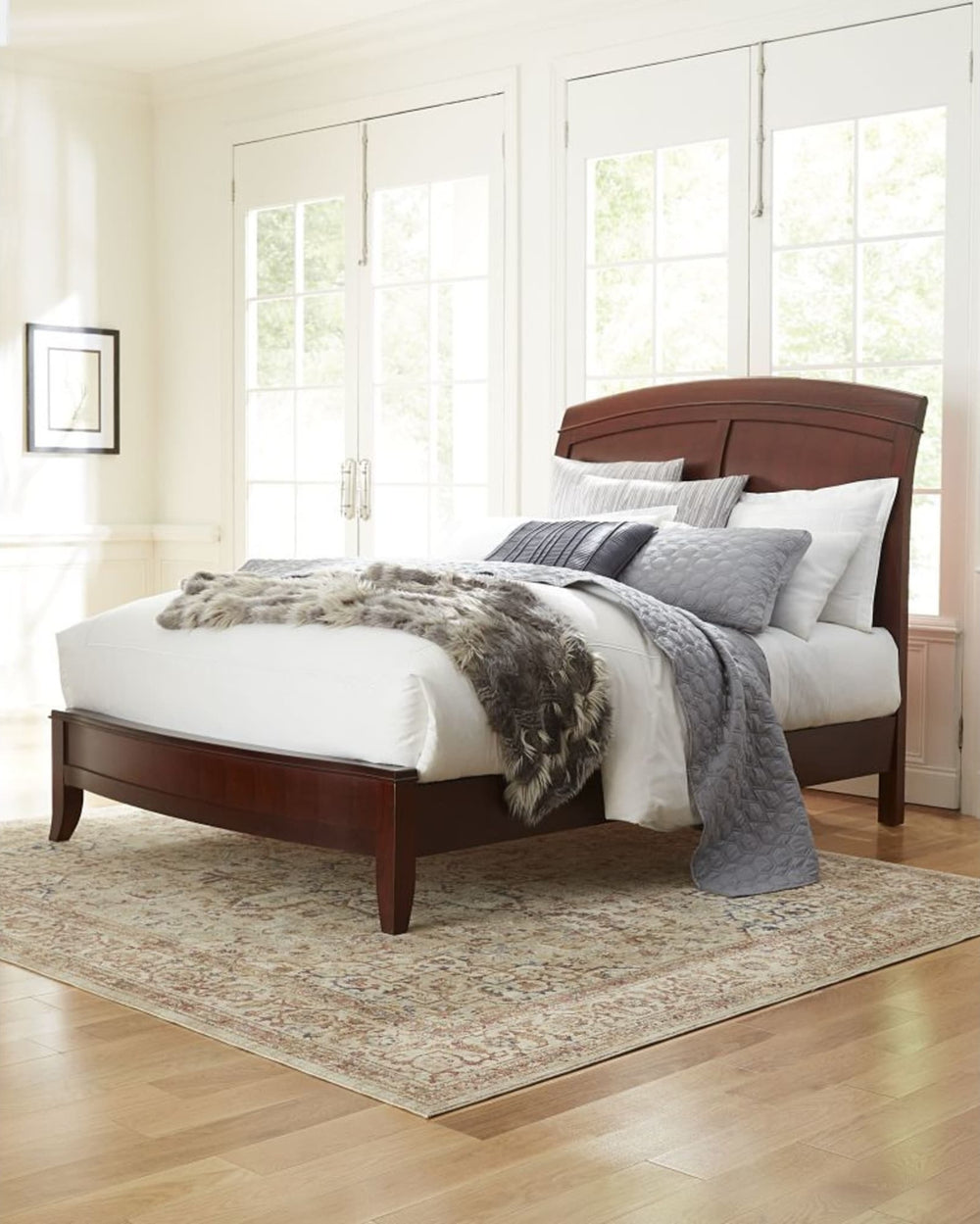 Brighton Wood Sleigh Bed in Cinnamon styled in a bedroom