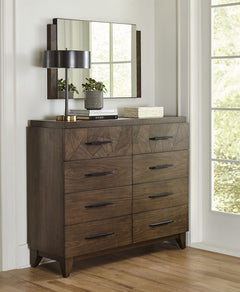 Broderick Eight Drawer Chesser by Modus in Wild Oats Brown — styled in a room