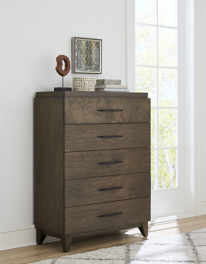 Broderick Five Drawer Chest in Wild Oats Brown — styled in a room