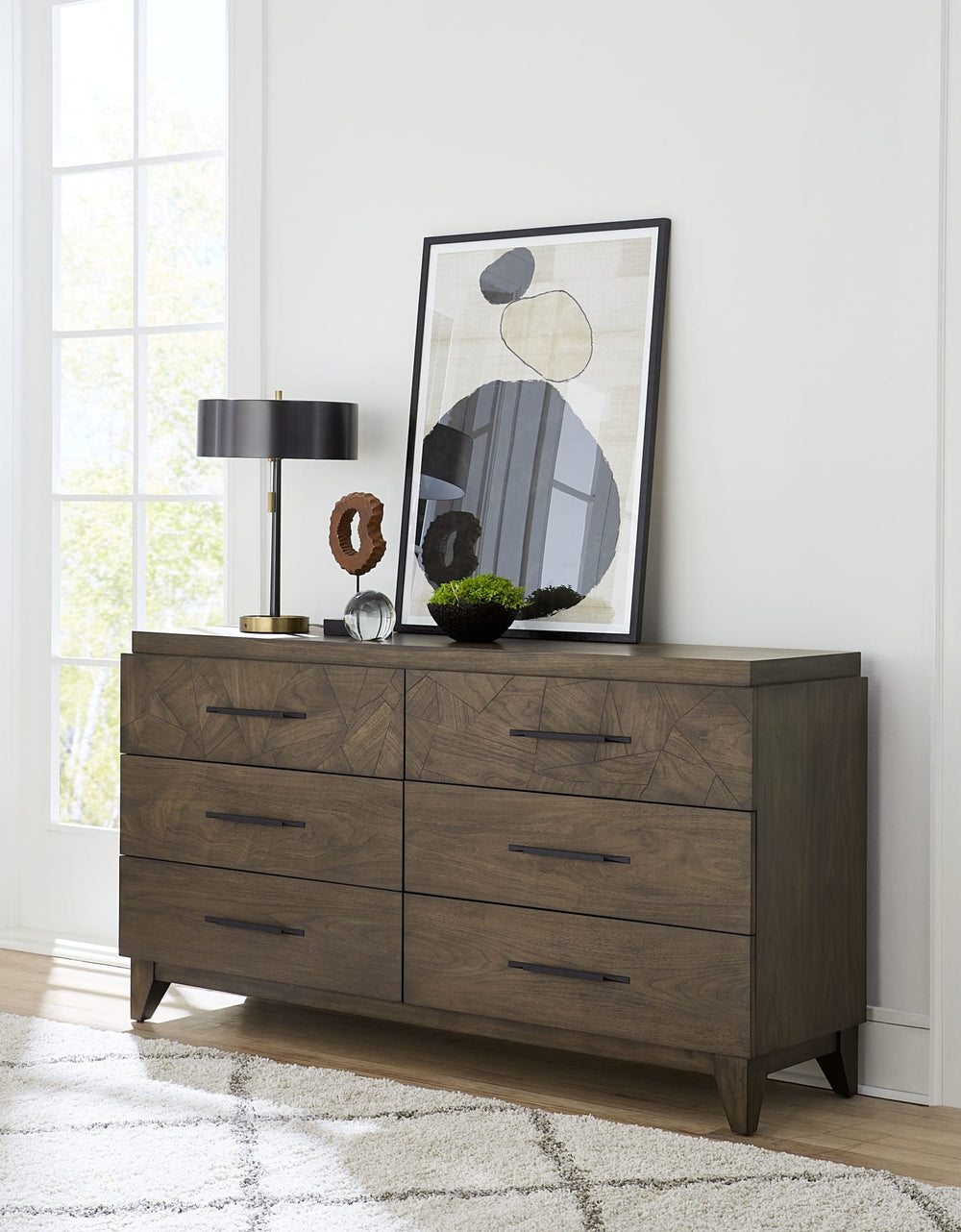 Broderick Six Drawer Dresser in Wild Oats Brown — styled in a room