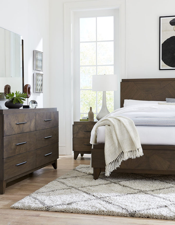 Broderick Six Drawer Dresser in Wild Oats Brown — in a bedroom setting