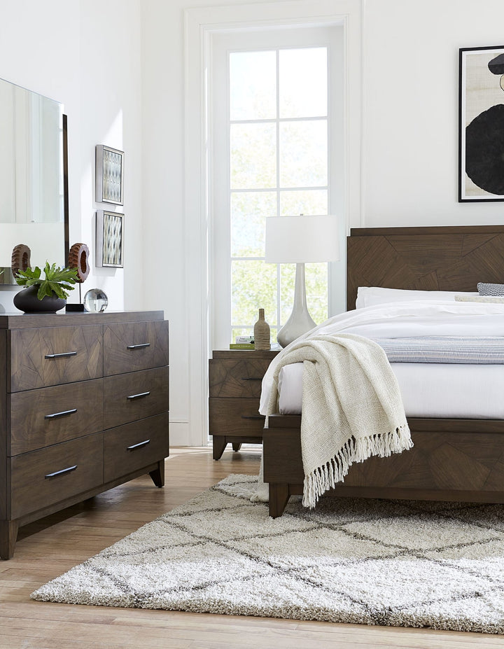 Broderick Wood Panel Bed in Wild Oats Brown styled in a bedroom