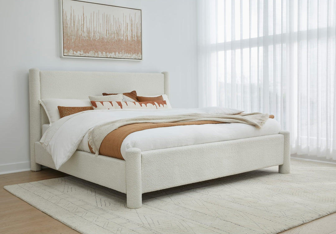 Burke Upholstered Platform Bed in Cottage Cheese Boucle styled in a bedroom