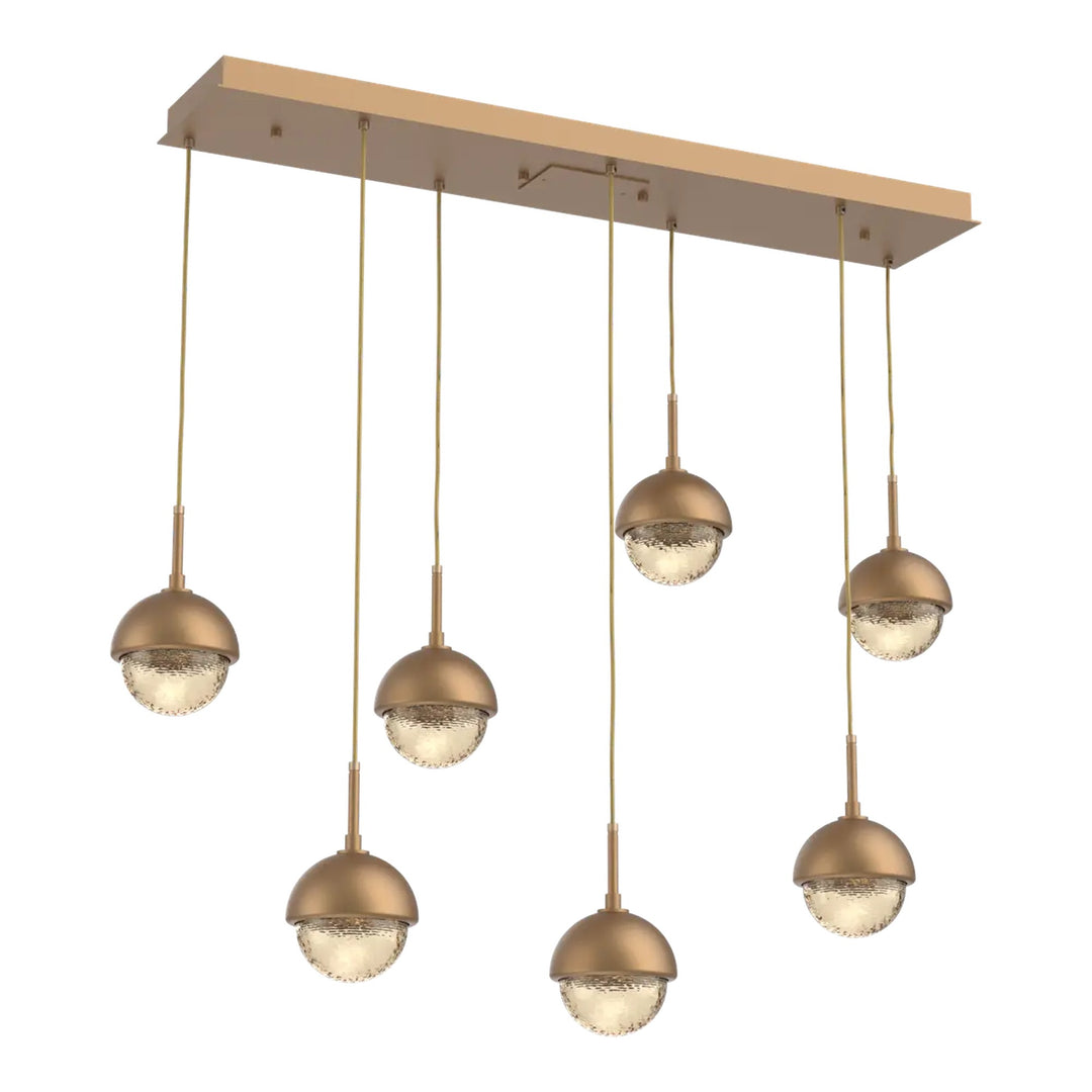 Cabochon Linear Pendant Chandelier by Hammerton Studio 7 Lights in Novel Brass with Amber glass