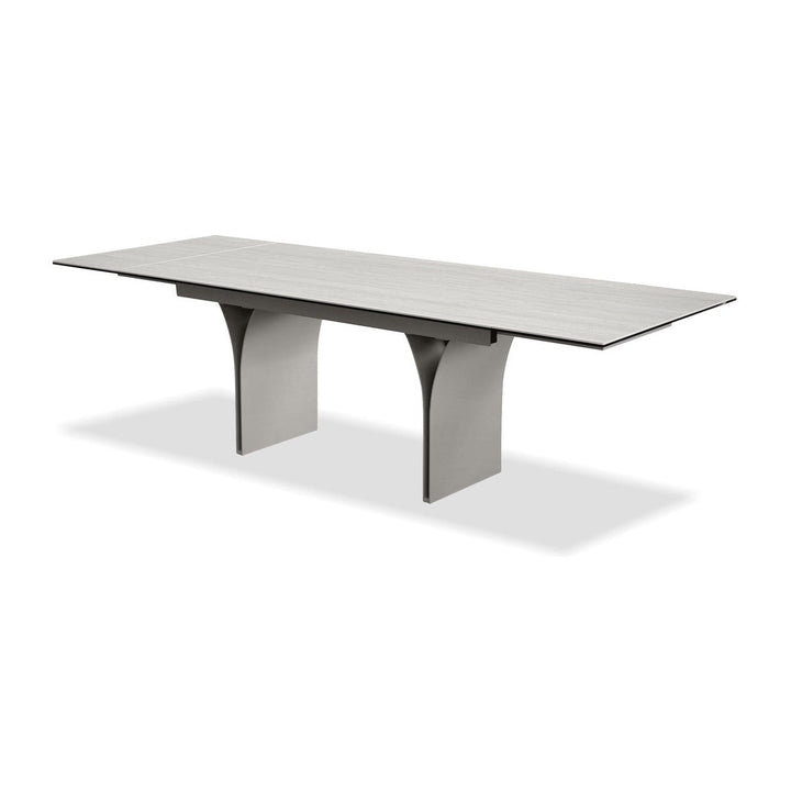 CAMBER Dining Table in Bianco Bocciardato Travertine Mobital