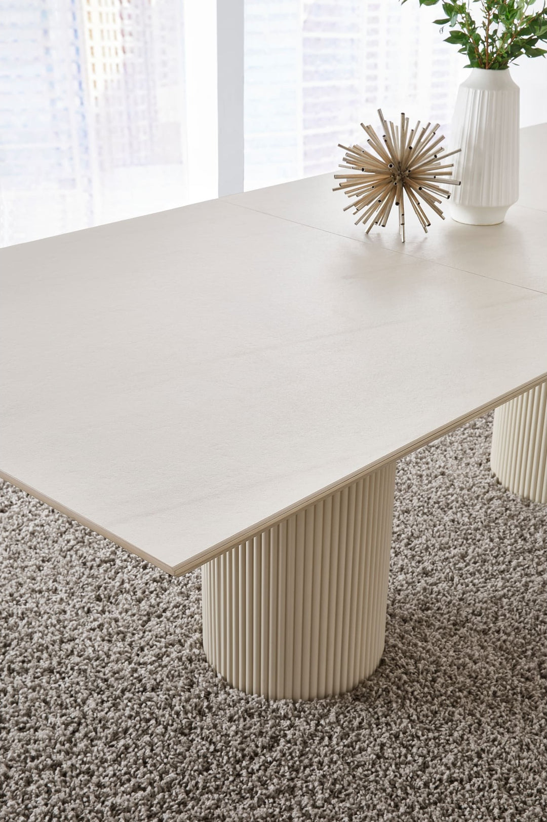 Cannon Stone Top Double Pedestal Extension Dining Table in Sintered Stone and Ivory — lifestyle photo