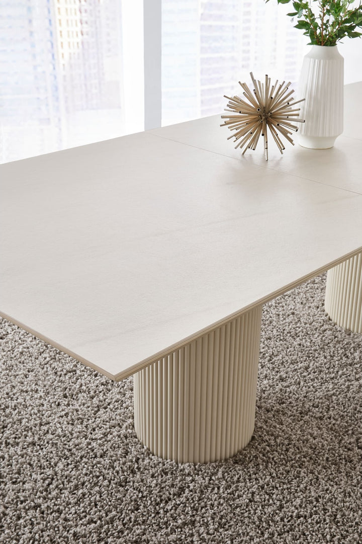 Cannon Stone Top Double Pedestal Extension Dining Table in Sintered Stone and Ivory — lifestyle photo