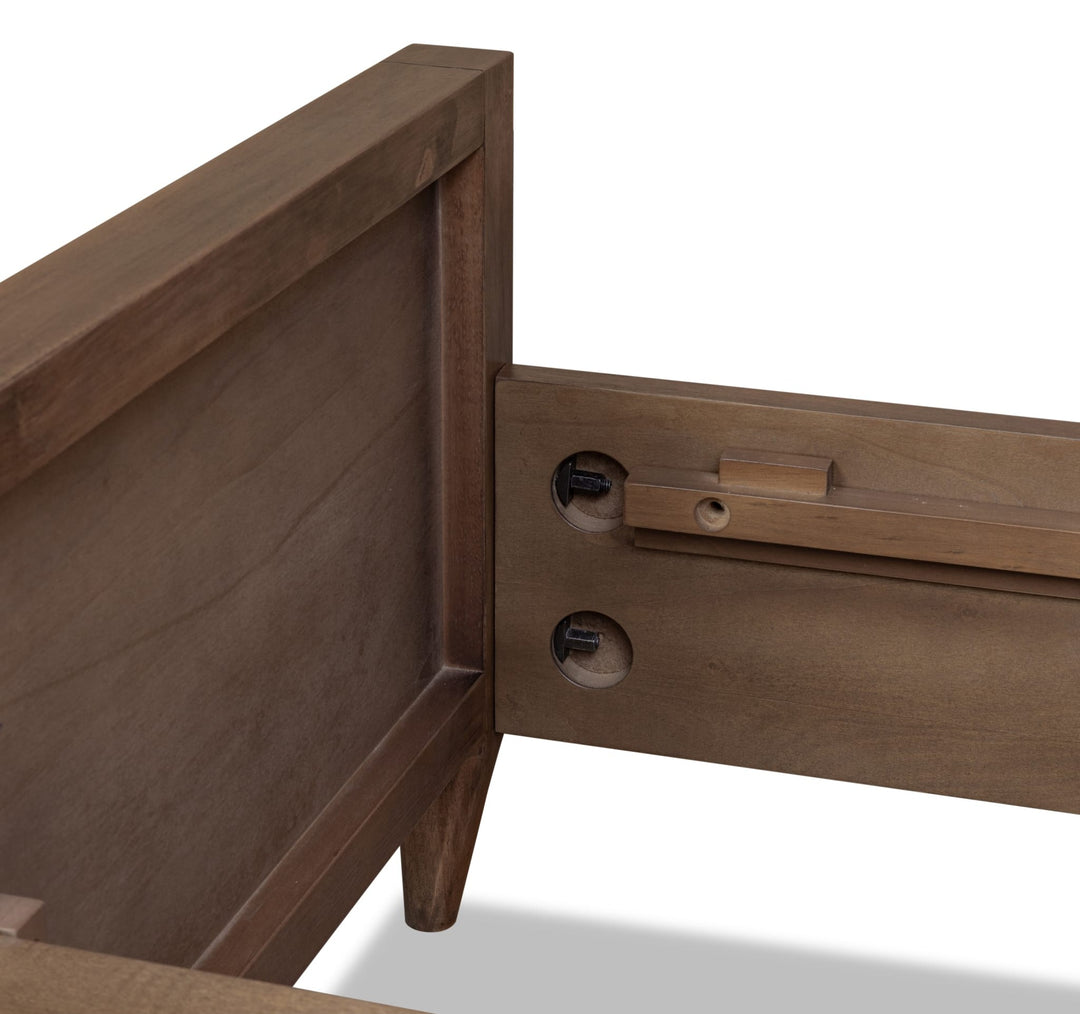 Carlisle Wood Panel Bed — close-up of the headboard post and rail fitting