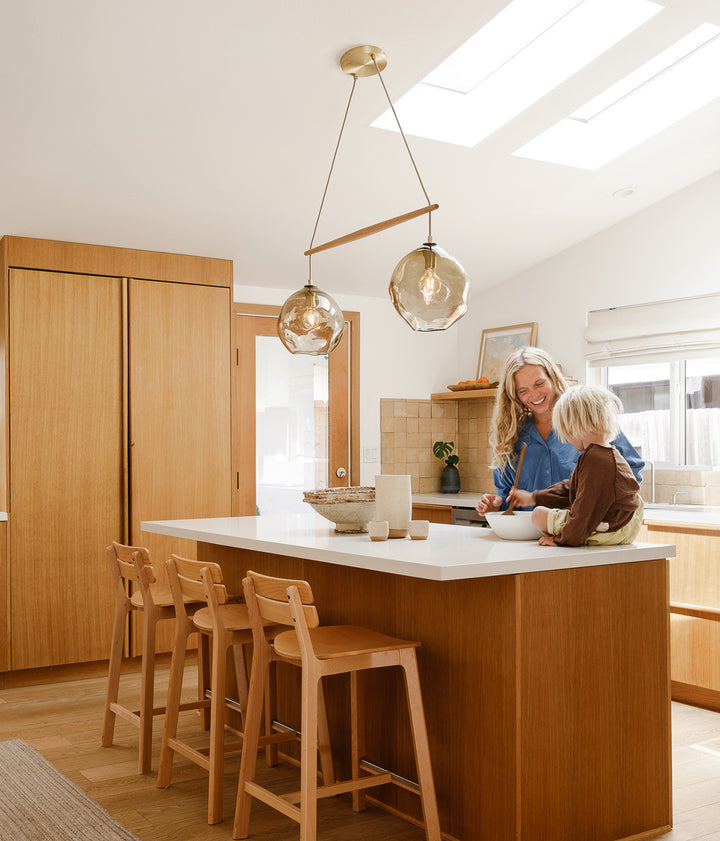 Cerno Linea Selva chandelier in a California modern family kitchen