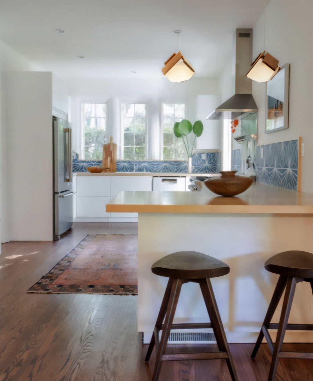 Cerno Mica S pendants above a modern kitchen