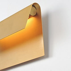 Natural Aged Brass Folded Sconce by Studio M Lighting – lifestyle