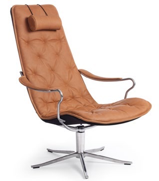 Conform Bravo high-back swivel chair in tan upholstery with button tufting, a padded headrest and polished metal four-star base