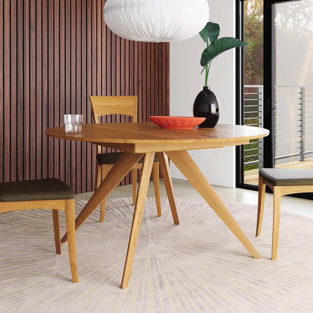 Catalina Round Extension Table with coordinating dining chairs