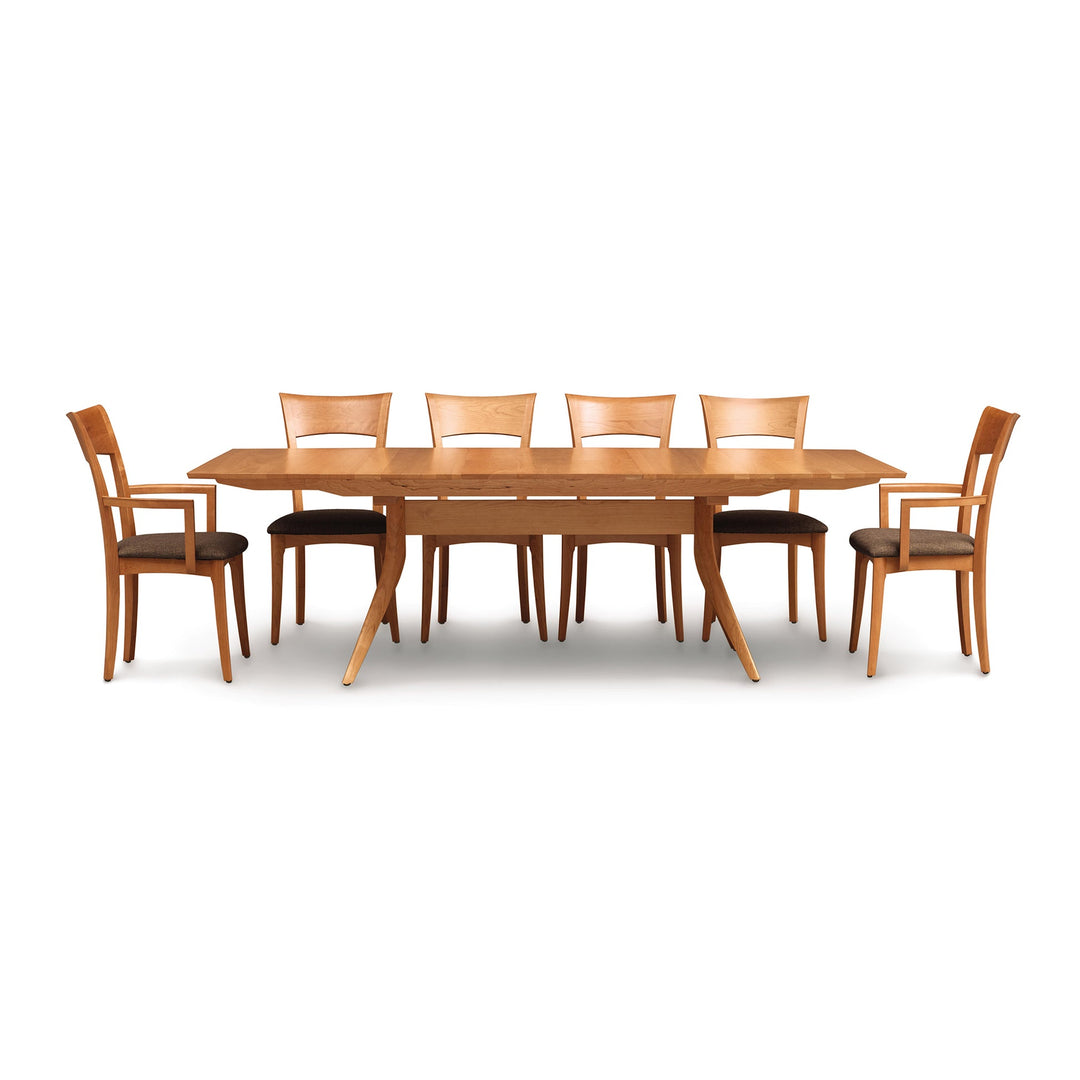 Catalina Trestle Extension Table with six upholstered dining chairs