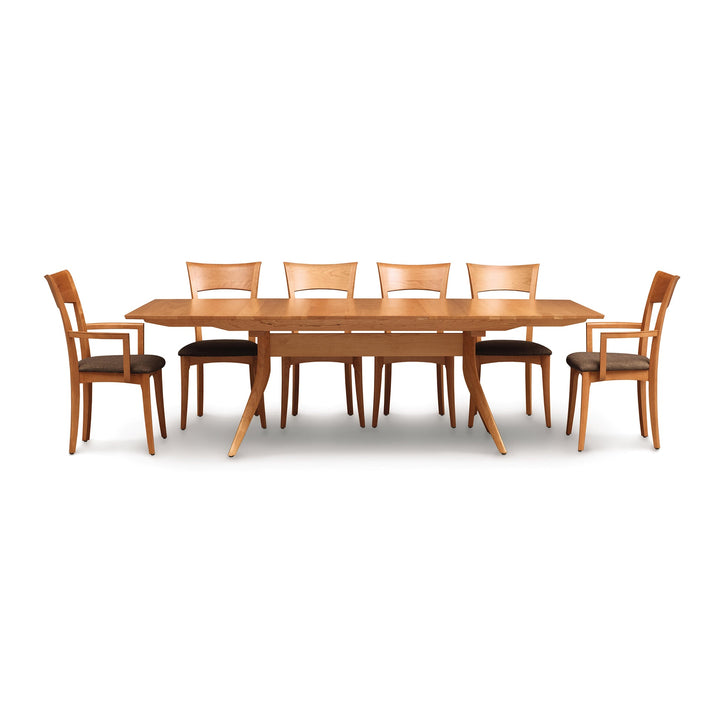 Catalina Trestle Extension Table with six upholstered dining chairs