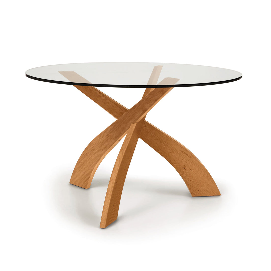 Copeland Entwine round glass top dining table