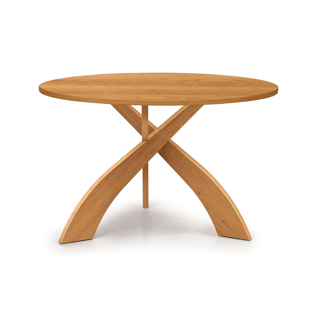 Copeland Entwine round solid wood dining table