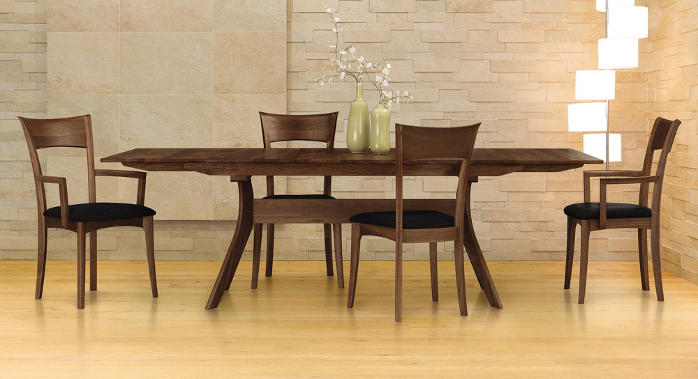 Copeland Ingrid armchairs and side chairs in a modern dining room