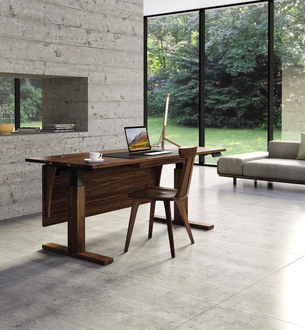 Invigo Sit-Stand Desk in a modern interior