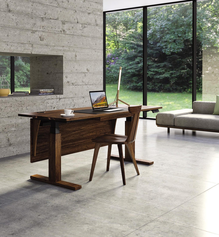 Invigo Sit-Stand Desk in a modern interior