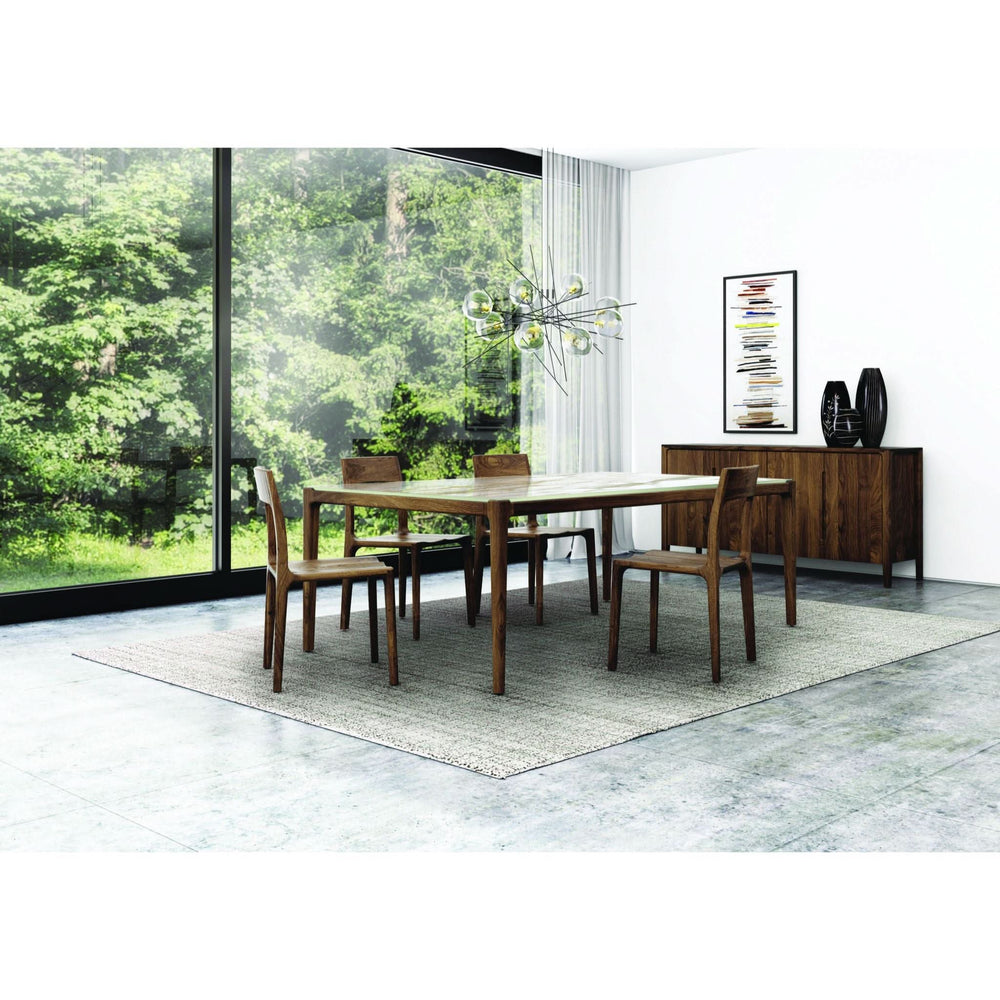 Lisse Sintered Stone Top Dining Table in a modern dining room