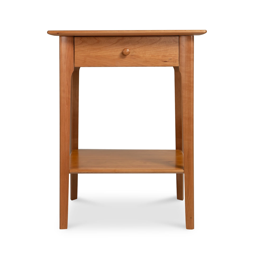 Sarah 1-Drawer Open Shelf Nightstand by Copeland Furniture made of sustainably harvested wood, showcasing a sleek design with a drawer and shelf.