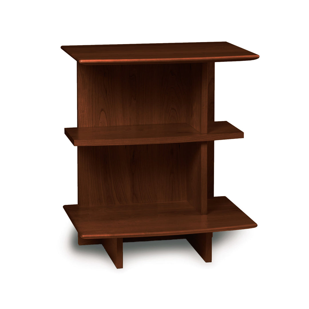 Small wooden nightstand with three staggered shelves and smooth finish from Copeland Furniture&