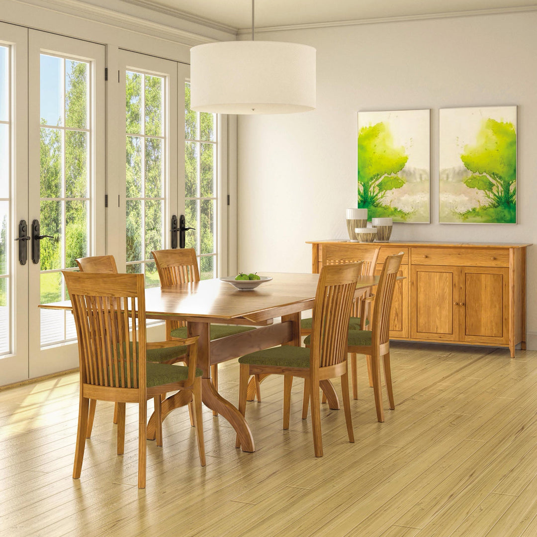 Copeland Sarah Trestle Extension Table in a modern dining room